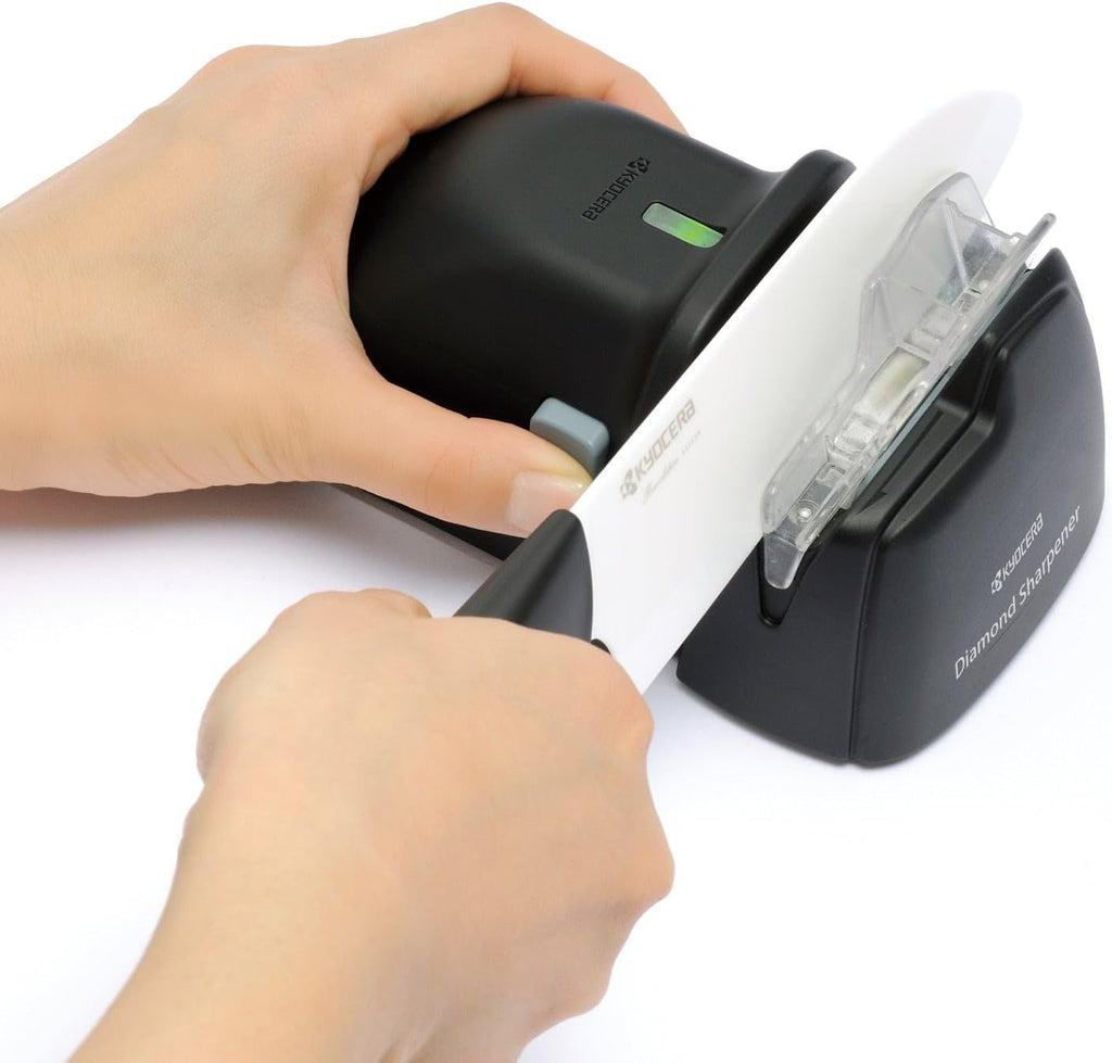 Kyocera Electric Diamond Knife Sharpener. For ceramic knives. Integrate Knife Guide and roller Assist. Battery operated.